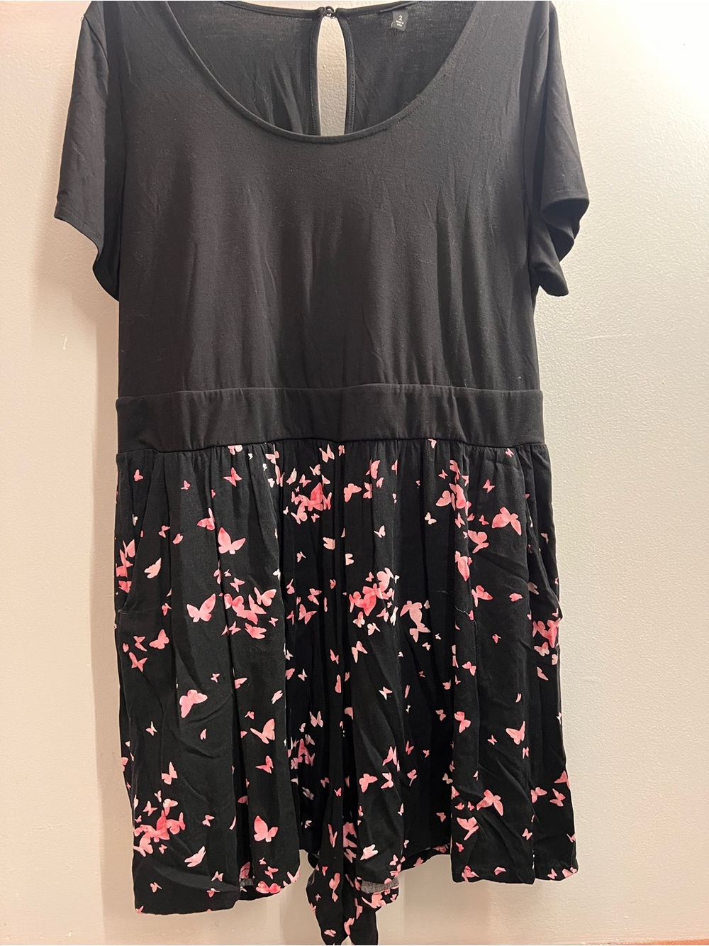 Women's Black Short-Sleeve Romper with Pink Butterfly Print